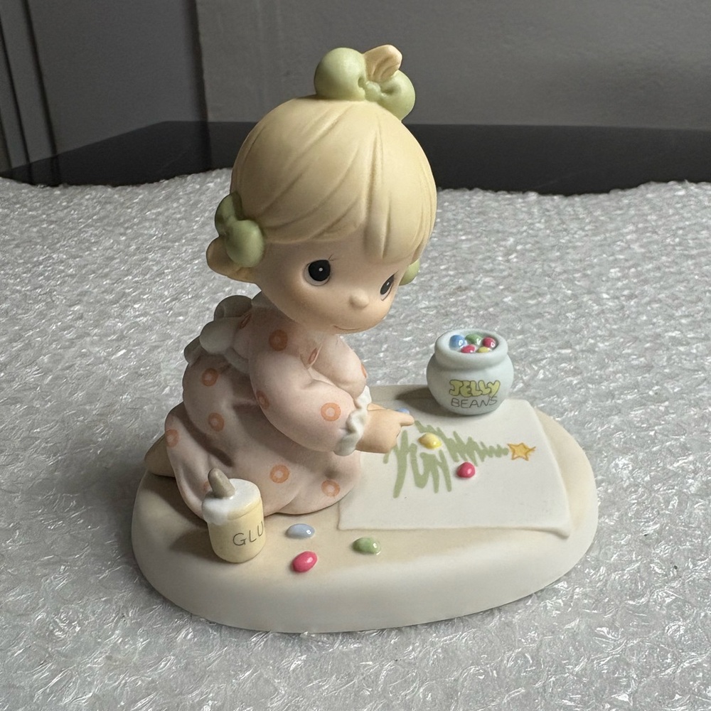 Precious Moments "May Your Seasons Be Jelly And Bright" figurine.